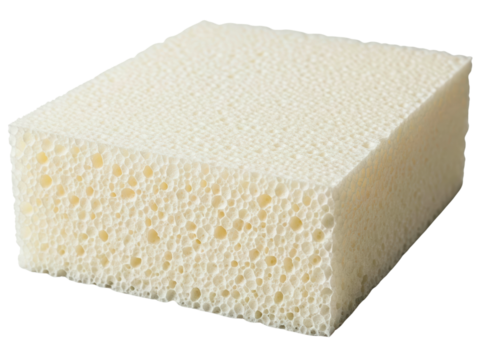 Rectangular block of porous synthetic foam material on a transparent background