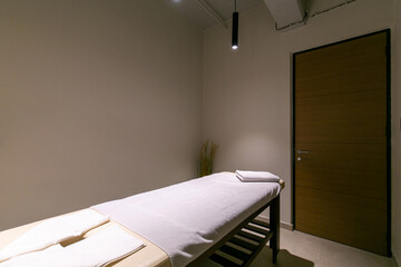 Interior of a massage room in hotel spa center