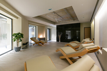 Relaxing spa interior with sun loungers