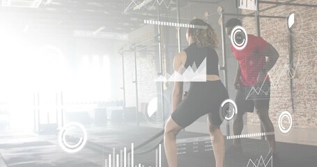Trainer cueing client whipping ropes, transparent analytics overlays tracking power during training - Powered by Adobe