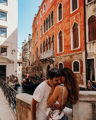 Couple kissing in Venice, Italy
