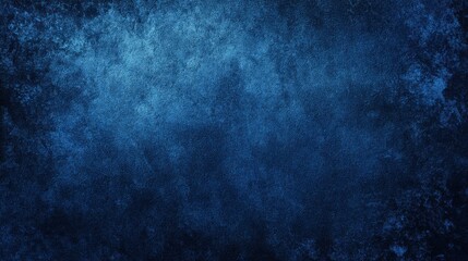 Obraz premium A rich deep blue surface features soft texture and variations. This artistic background creates a calming atmosphere ideal for creative projects or presentations.