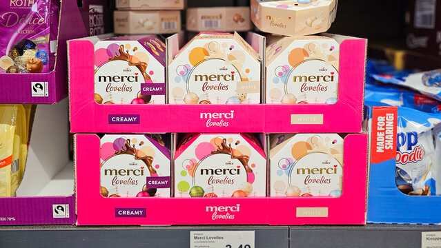 Menden, NRW, Germany - July 29, 2025 Confectionery shelf: Colorful packaging of Storck merci Lovelies in pink