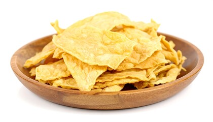 Pile of crispy golden snacks on wooden plate