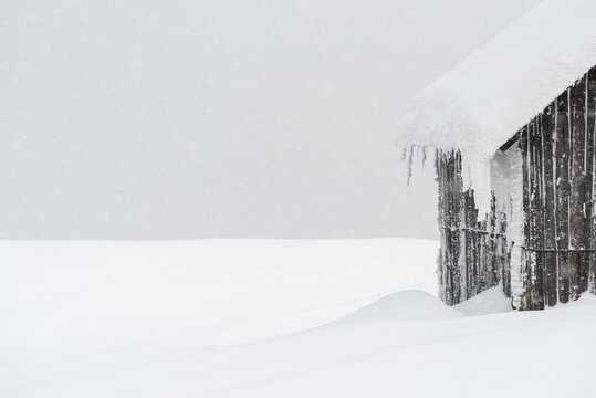 Minimal Winter Snowy Background With Copy Space And Rustic Frosty Barn