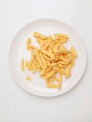 Corn crunchy snacks on white background