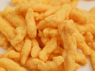 Corn crunchy snacks on white background
