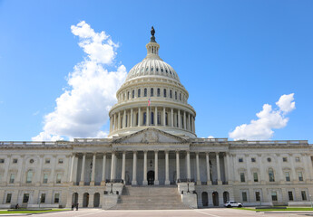 Naklejka premium Washington, DC, USA - August 26, 2025: Capitol Hill dome and staircase seat of Congress