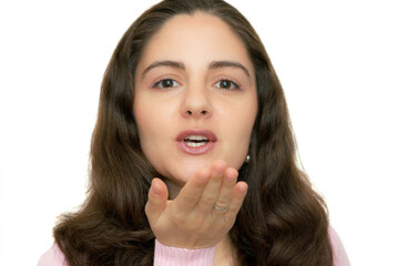 Fototapeta premium Young Woman Blowing a Kiss