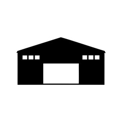 Black and White Silhouette of a Warehouse Building with Open Bay Door