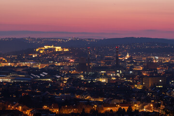 Brno, Czech Republic - March 29, 2025: View of the city from above at night. Evening city panorama. Špilberk Castle