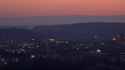 Brno, Czech Republic - March 29, 2025: View of the city from above at night. Evening city panorama. Špilberk Castle