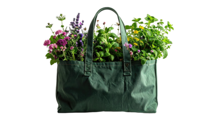 A dark-green tote bag overflowing with vibrant wildflowers and herbs
