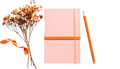 Pink notebook, dried flowers, orange ribbon, pencil