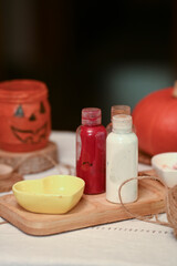 
Preparing to paint a pumpkin for Halloween at home