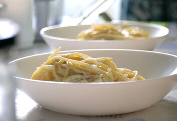 wo White Bowls Filled with Freshly Made Pasta Carbonara