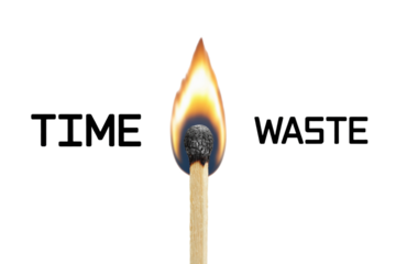 Burning matchstick representing the concept of time waste and urgency
