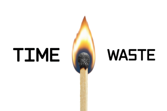 Burning matchstick representing the concept of time waste and urgency