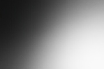 Obraz premium Smooth black to white gradient background with gentle vignetting and subtle grain