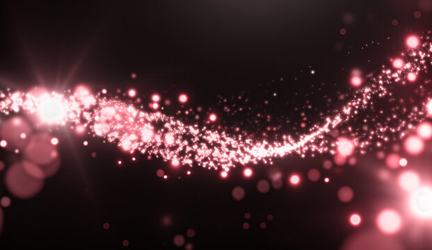 Sparkling bokeh festive background. Glowing particles with glitter light effect, celebration design. Red dust sparkle. isolated in black background