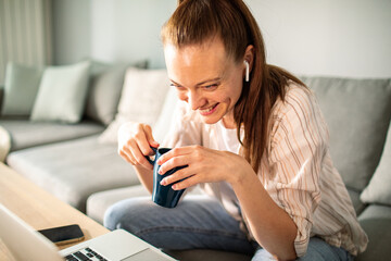 Woman enjoying coffee at home