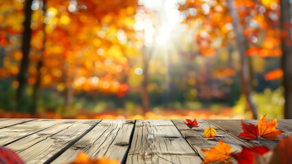 Wooden table with autumn leaves in a sunlit forest