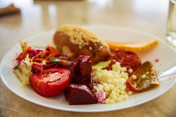 Delicious roasted vegetables served on a plate, showcasing vibrant colors and appetizing texture.