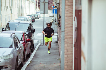 Man running on city street