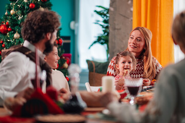 Family enjoying christmas dinner together at home
