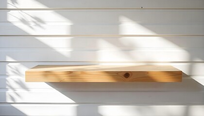 A wooden shelf on a wooden wall with sunlight casting shadows , simple and clean design, minimalist aesthetic, bright and airy atmosphere.