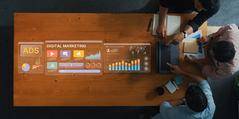 A group of professionals collaborates on digital marketing strategies using data visualization...