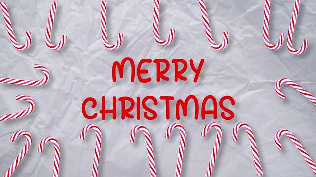 Animated Christmas video with candy canes forming festive frame on crumpled paper background Winter holiday motion graphic template, greeting card design. Red text Merry Christmas Loop animation