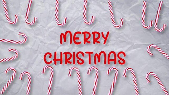 Animated Christmas video with candy canes appearing around crumpled paper background forming festive frame, Merry Christmas greeting text in center, winter holiday motion graphic template.