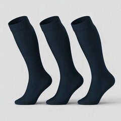 Three pairs of dark blue knee high socks arranged in a row