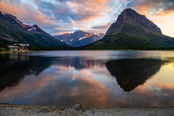 Sunset Reflections of the Mountains of Glacier and Many Glacier Hotel, Many Glacier, Glacier National Park, Montana