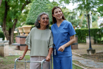Caregiver provides assistance and support to senior in park, showcasing importance of care and companionship in enhancing quality of life