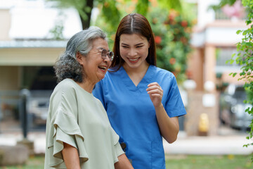 Caring caregiver provides assistance and support to senior, enhancing their well being and happiness through compassionate care and companionship