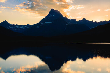 Sunset Reflections of the Mountains of Glacier above Swiftcurrent Lake, Many Glacier, Glacier National Park, Montana