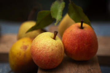 Natural background with ripe pears close-up, selective focus