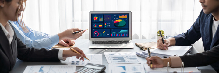 Business intelligence and data analysis concept. Analyst team working on financial data analysis...