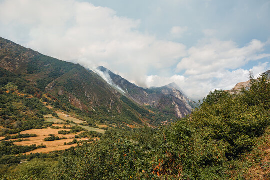 Smoke rising from a forest fire in the Somiedo Valley
