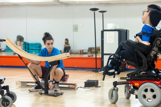 Boccia player with cerebral palsy during training session