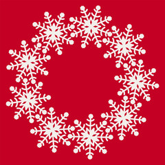 Ornate white snowflake wreath with intricate branches, seamless circular pattern on vibrant red background for festive holiday designs and decor