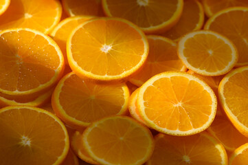 Orange rounds spread out as food background