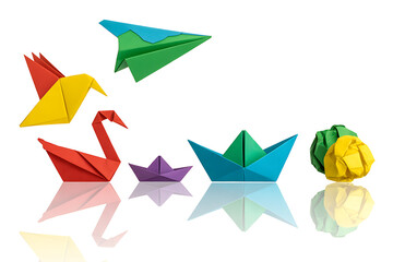 Colorful origami animals and boats arranged on a white background with reflections