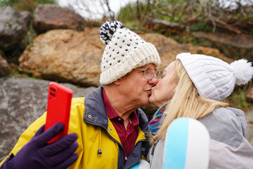 Older couple enjoys winter activities together