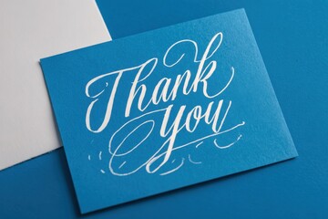 Expressive Handwritten Gratitude Note on Blue Backdrop - A Heartfelt Thank You Card Design