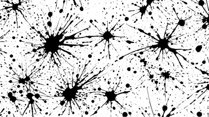 Black and white ink splatters captured on a white background surface creating abstract expressive stains with artistic textured composition and graphic detail