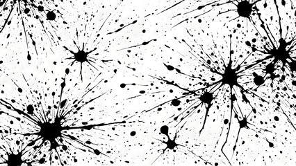 Black and white ink splatters on a plain white surface forming random stains and abstract artistic composition with expressive textured graphic pattern