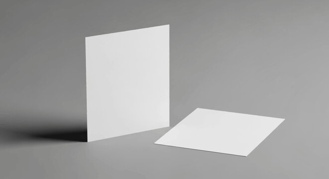 Minimalist White Business Cards on a Subtle Gray Background with Soft Shadows and Subtle Lighting Showcasing Simple Elegant Design Elements